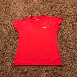 Bright orange Underarmour heat gear shirt - M